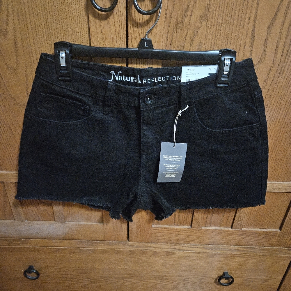 Black denim cut off shorts. New with tags.